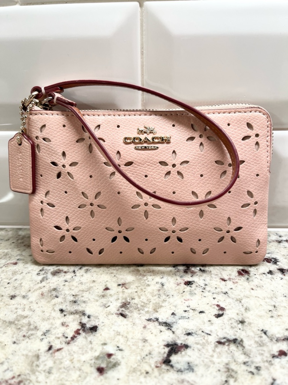 Coach Floral Perforated Sparkle Pink Floral Laser Cut Leather Wristlet EUC